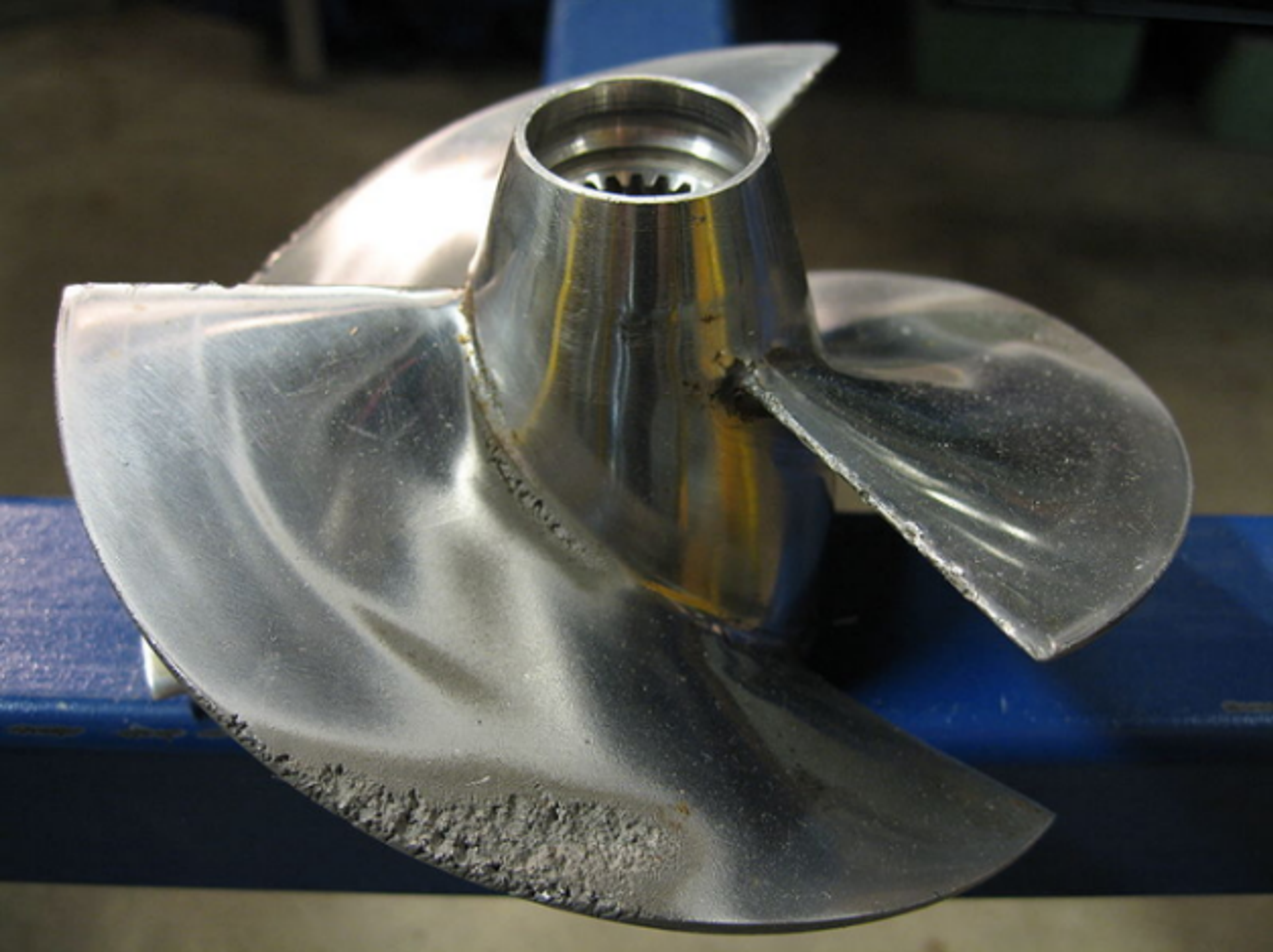 Figure 7. Photograph of cavitation erosion concentrated near the outer edge of a marine propeller blade